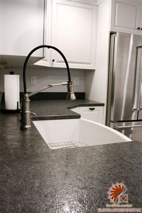 steel gray leathered granite with gray cabinets|can you leather existing granite.